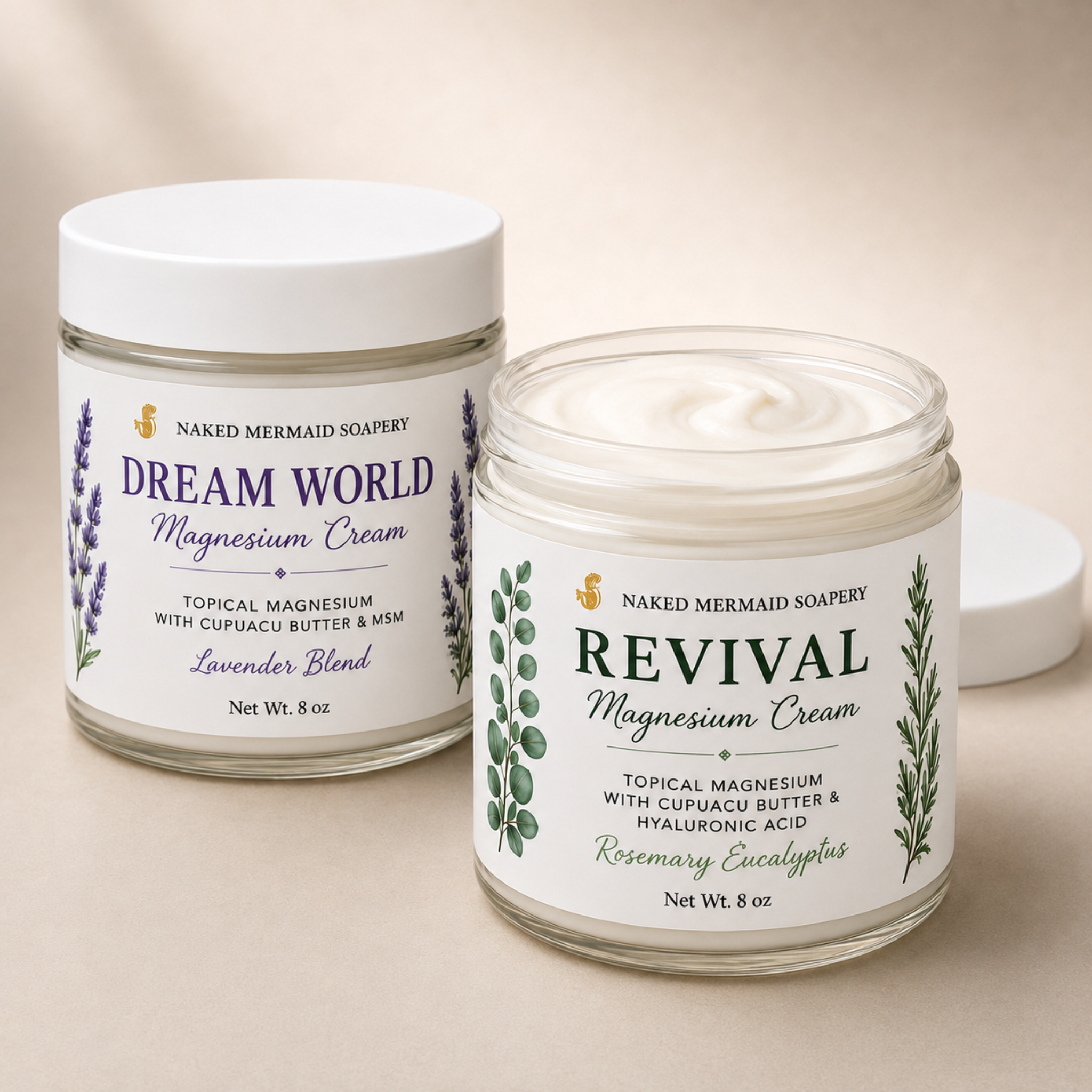 Naked Mermaid Soapery Dream World and Revival 8 oz magnesium cream jars, with Revival open to show the smooth cream texture.