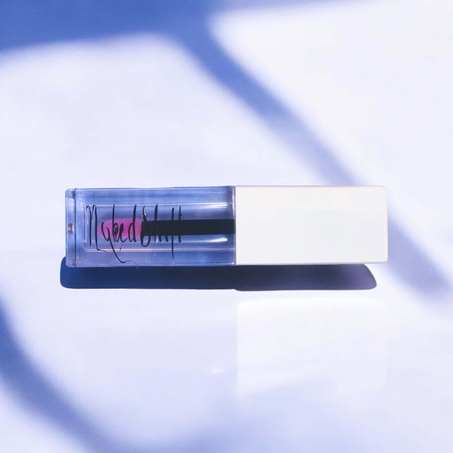 NakedShift color-changing lip gloss by Naked Mermaid Soapery blends with your pH for a personalized pink shade.