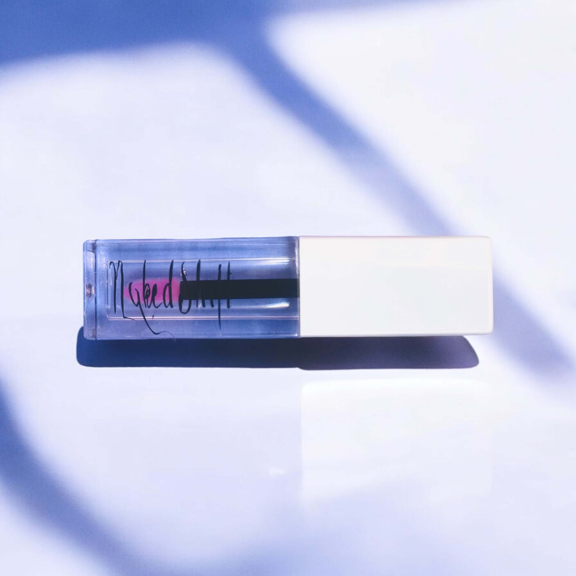 NakedShift color-changing lip gloss by Naked Mermaid Soapery blends with your pH for a personalized pink shade.