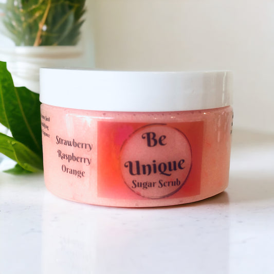 Be Unique Flamingo sugar scrub.  Scent blend of strawberries, raspberries and oranges.  Manufactured by Naked Mermaid Soapery LLC