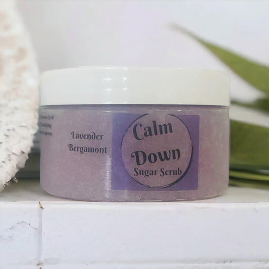 Calm Down Sugar Scrub is a blend of Lavender and Bergamont.  A large 10 ounce jar. Manufactured by Naked Mermaid Soapery LLC