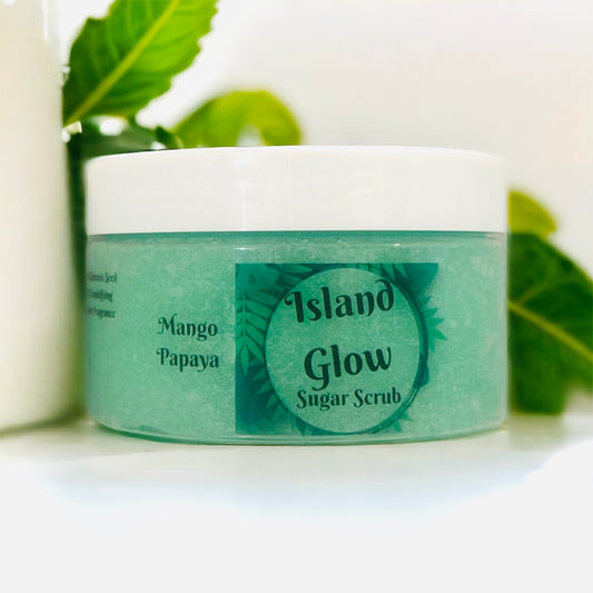 Island Glow exfoliating sugar scrub.  A scent blend of fresh sea salt, mango and papaya.  Manufactured by Naked Mermaid Soapery LLC