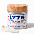 1776 body cream in a 4 oz jar