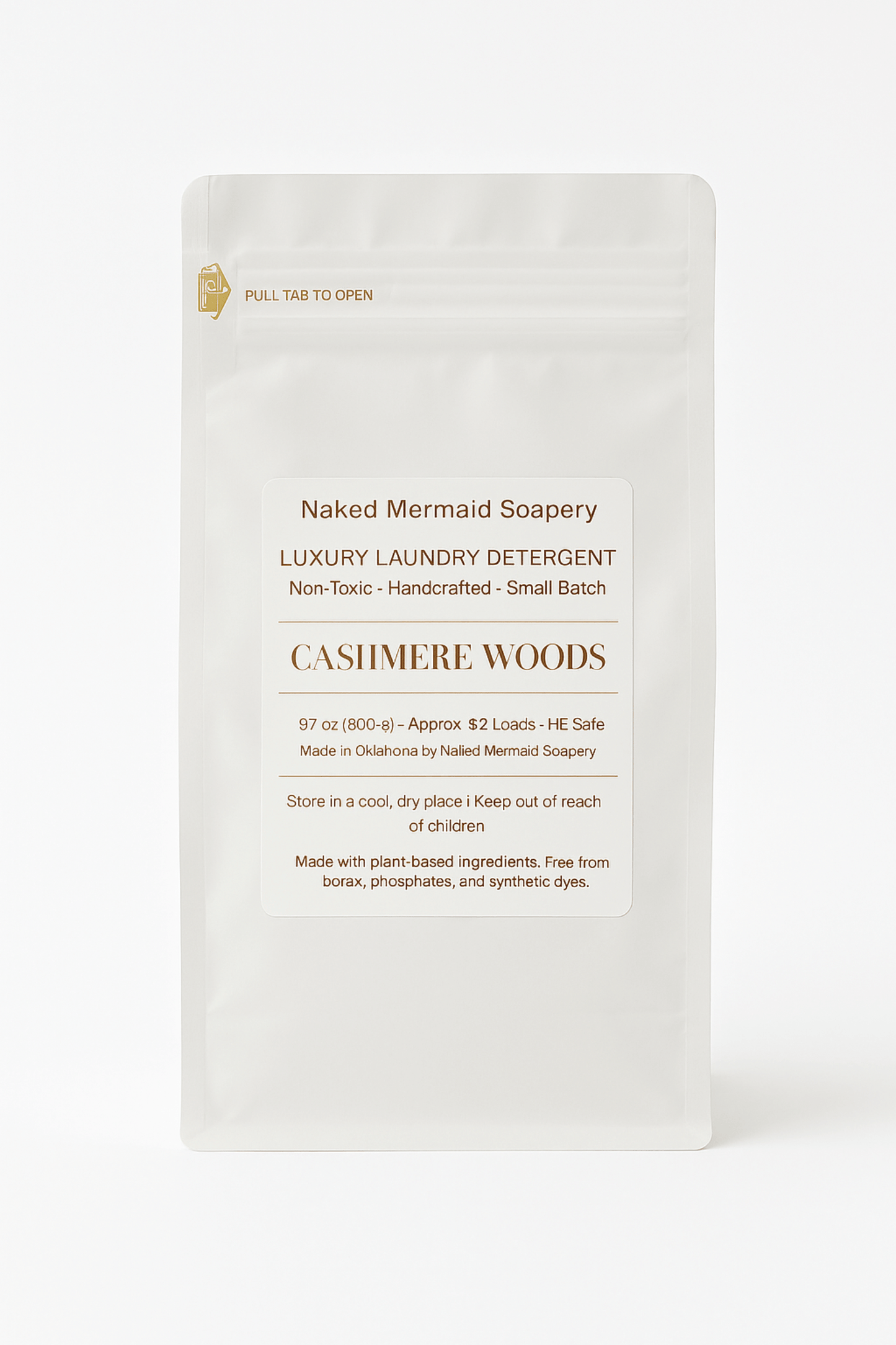Cashmere woods laundry detergent in a white 32 oz resealable bag