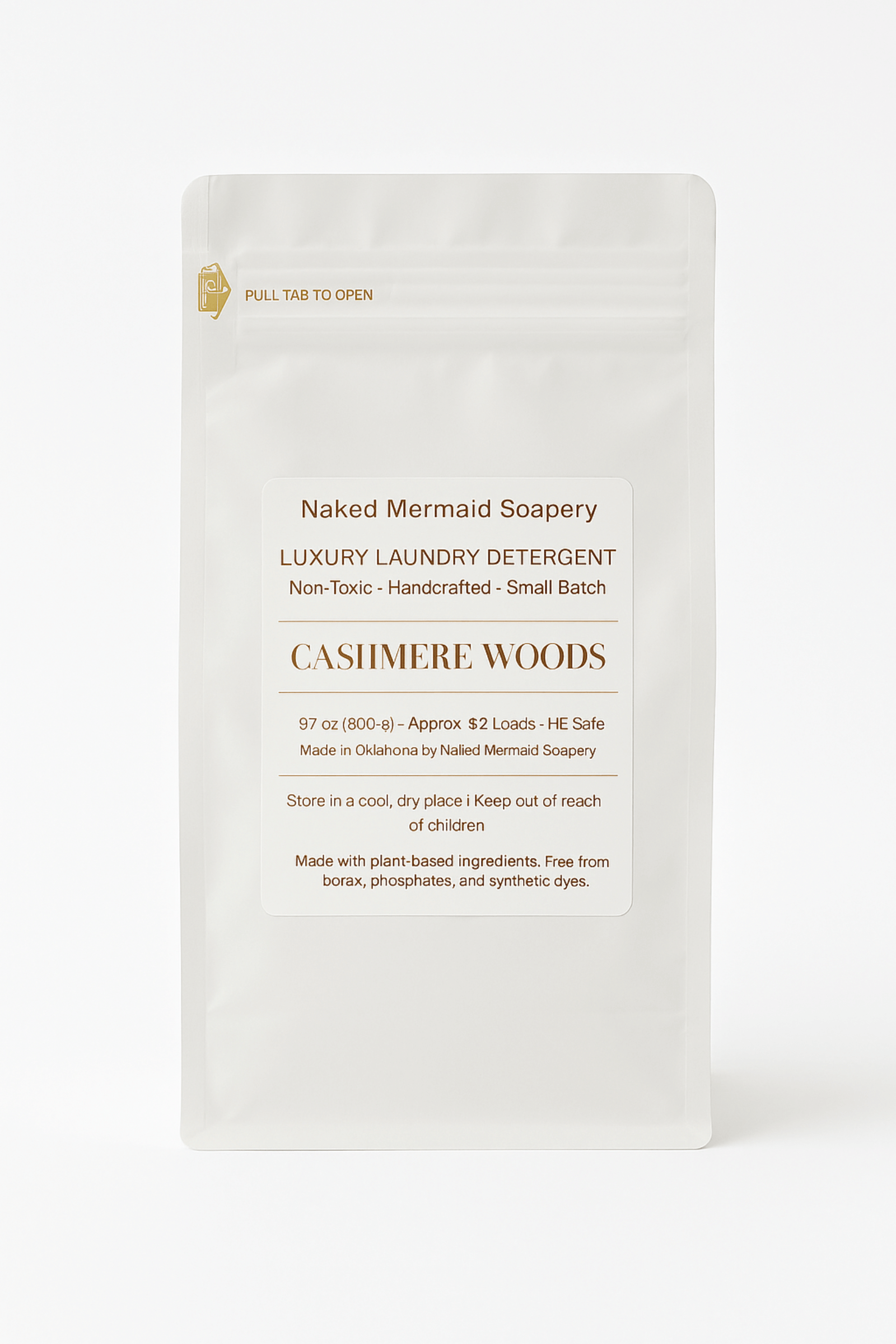 Cashmere woods laundry detergent in a white 32 oz resealable bag