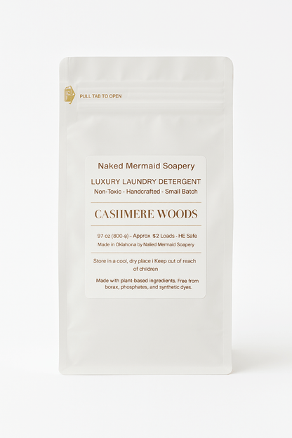 Cashmere woods laundry detergent in a white 32 oz resealable bag