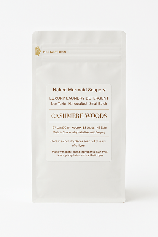 Cashmere woods laundry detergent in a white 32 oz resealable bag