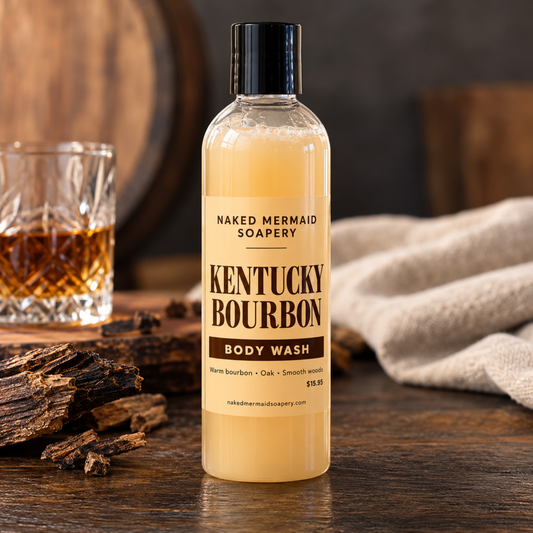 Kentucky Bourbon Body Wash by Naked Mermaid Soapery in a clear 8 oz bottle with black cap, featuring warm bourbon, oak, and smooth wood fragrance notes.