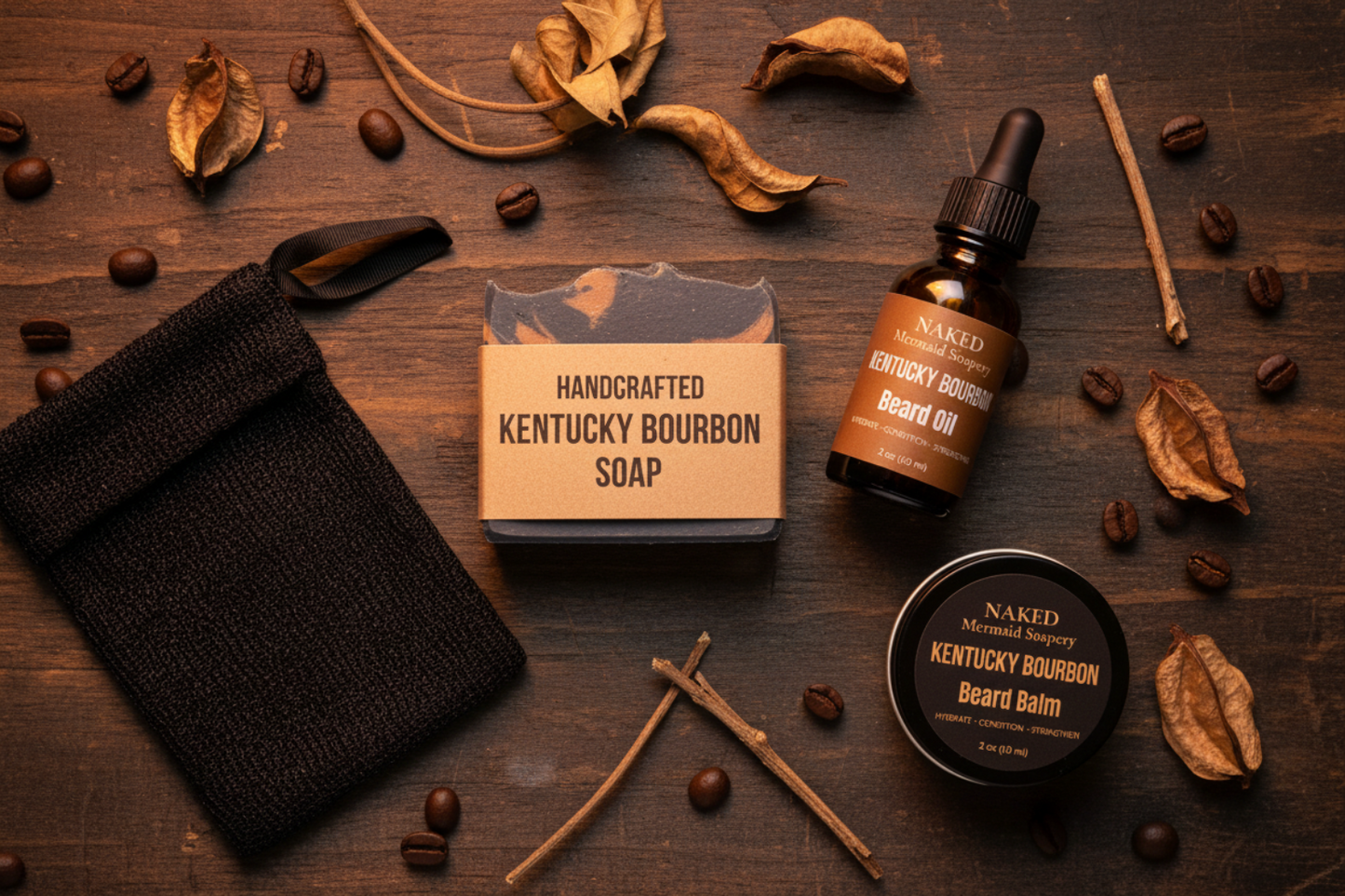 Kentucky Bourbon Men's Grooming Set flat lay featuring soap bar, beard oil, beard balm, and soap saver bag