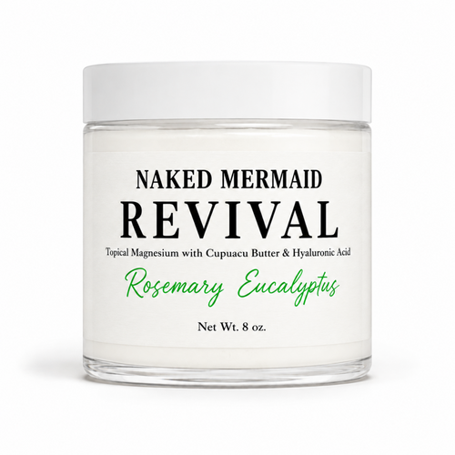 A clear glass jar of Naked Mermaid Revival Rosemary Eucalyptus topical magnesium cream with a white lid and white label, set against a plain white background.