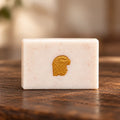 Black Pepper & Bergamot tallow soap bar with gold eagle stamp by Naked Mermaid.