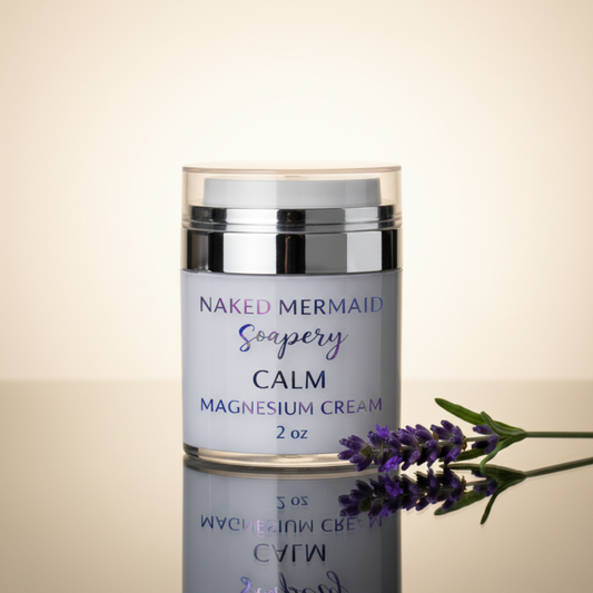Naked Mermaid Calm Magnesium Cream jar with lavender on a beige background