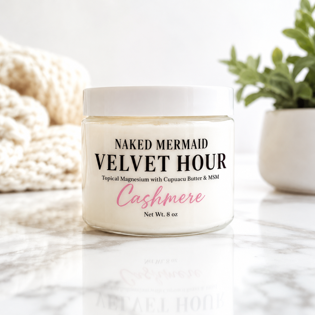 Naked Mermaid Soapery Velvet Hour Cashmere Topical Magnesium Cream in an 8 oz clear jar with white cream on a soft neutral background.